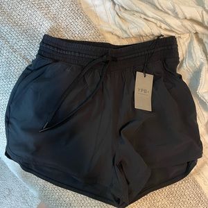 Abercrombie YPB running shorts size medium, black. Brand new with tags.